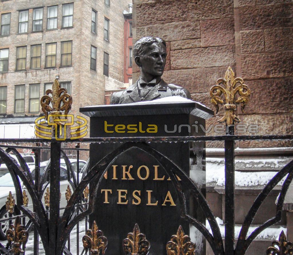 The Tesla statue at St. Sava Cathedral showing Tesla's name in gold