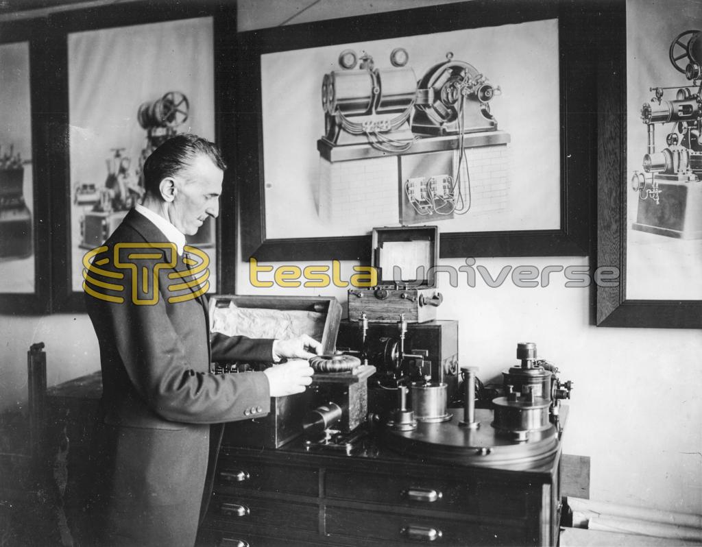 Tesla in his New York office in 1916, demonstrating an electrical apparatus
