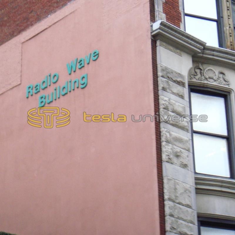 The large "Radio Wave Building" title on the side of the former hotel where Tesla stayed