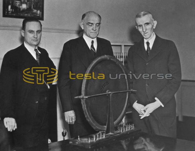 John T. Morris and Victor Beam pose with Nikola Tesla and his alternator