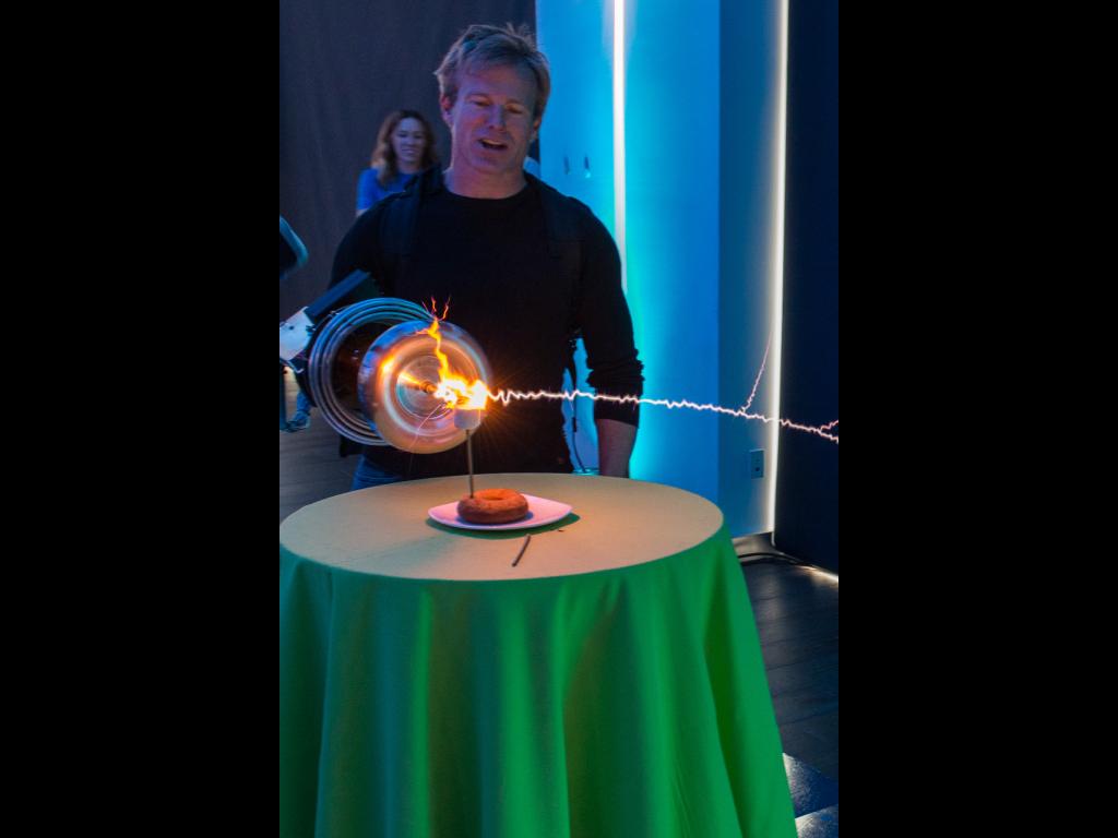 Travis Taylor roasting marshmallows with the Tesla gun